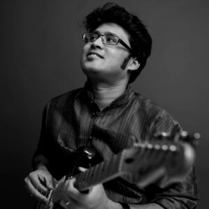 Abhay Nayampally, a Carnatic classical guitarist, performing on an electric guitar. He's a senior disciple of the late U Srinivas and was awarded 'Best Guitarist of 2023' for his solo album.