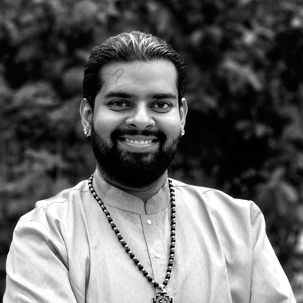 Portrait of Abhishek N. S., a B-High Graded artist with All India Radio Bangalore, performing in traditional attire. He is the founder of Shankara Academy of Fine Arts and a Senior Manager at Subramaniam Academy of Performing Arts (SaPa).