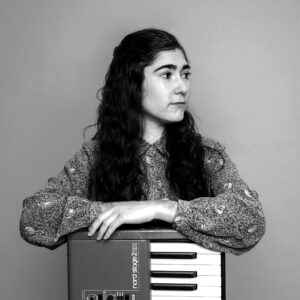 Danae Greenfield, a talented jazz pianist based in Brooklyn, has performed with renowned artists and released her debut EP "Shelter," showcasing her innovative sound and versatility across multiple genres.