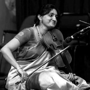 H.M. Smitha, a talented Carnatic violinist from a musical lineage, has performed with renowned artists and received multiple awards for her contributions to music.