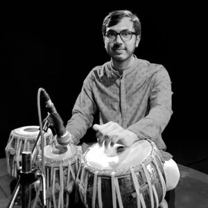 Kaushik G Bhat is a Bangalore-based tabla player specializing in classical music, performing with renowned artists and also a certified front-end developer.