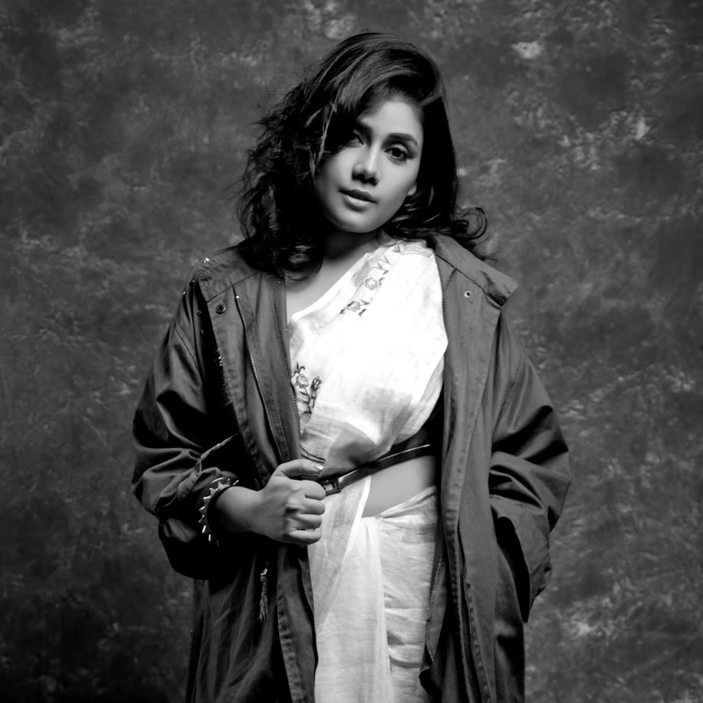 Paroma Dasgupta, an Indian singer known for her Bollywood and Tollywood work, shares her performances and cultural experiences on social media, blending traditional and contemporary music styles.