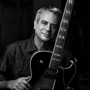 Ricardo Silveira, a renowned Brazilian guitarist, is celebrated for his sophisticated compositions and collaborations with legendary artists, as well as his contributions to jazz music internationally.