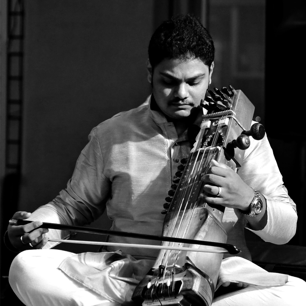 Sarfaraaz Khan, a talented Sarangi player from Dharwad, comes from a prestigious musical lineage and has won multiple awards for his contributions to classical and film music.