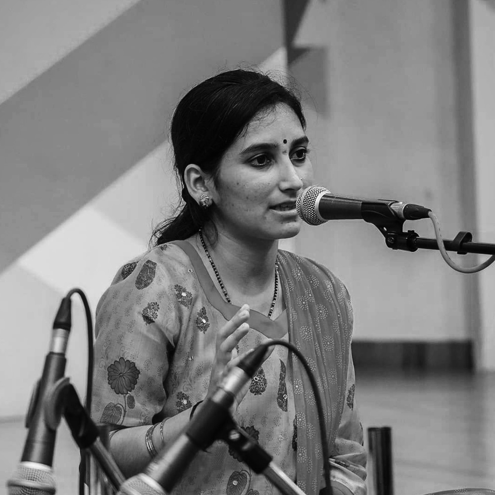 Shruti Bode, a skilled musician with 24 years of experience, excels in classical and light music, performing internationally and teaching in Bengaluru while composing Kannada songs.