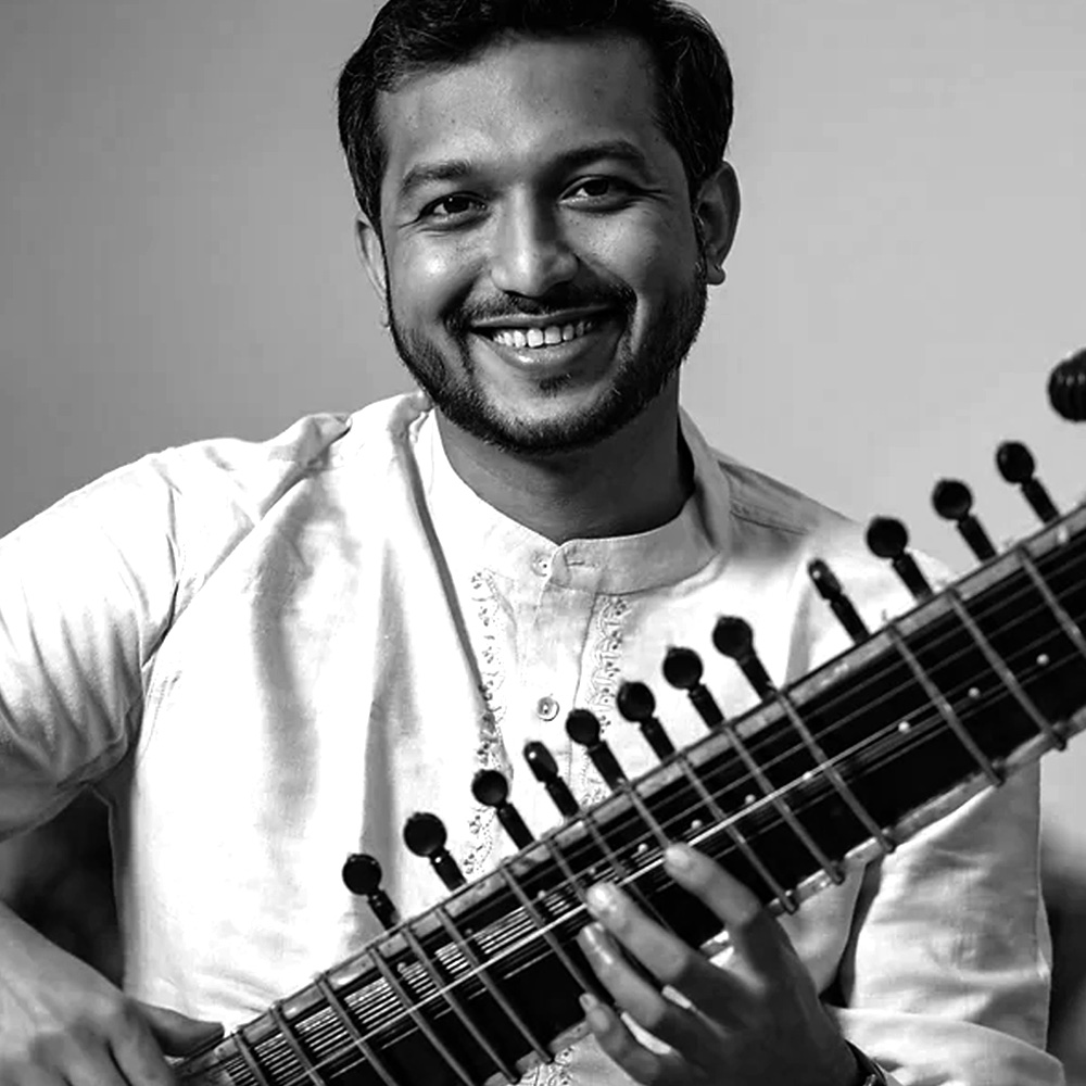 Soumitra Thakur, a skilled sitar player, blends influences from various Gharanas and promotes art through The Pink Lotus Academia while reviving traditional Baithak concerts.