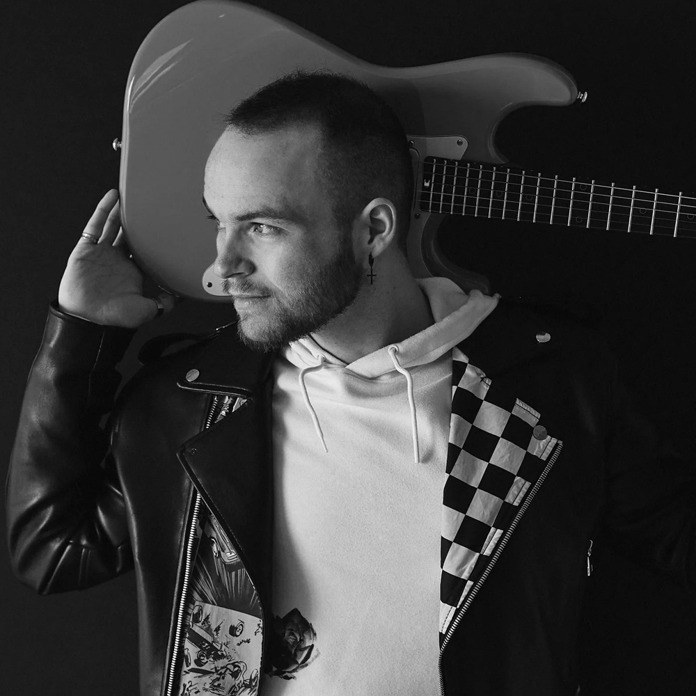 TJ Whitelaw, a talented guitarist and composer from Toronto, is known for his gospel-fusion style and engaging teaching methods, helping musicians enhance their skills while performing captivating live shows.