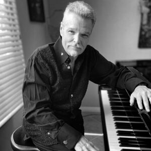 Thomas William Schuman, an American jazz pianist and longtime member of Spyro Gyra, is known for his contributions to contemporary jazz and his solo work as a composer and producer.