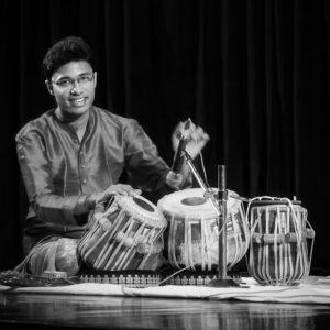 Ujith Udayakumar is a talented tabla player and BA student, recognized for his achievements in music competitions and honored by the Vice President of India.