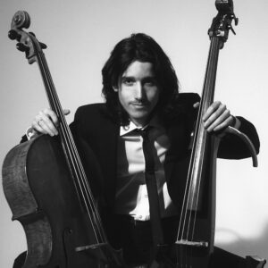 Yoed Nir, a renowned cellist and composer, blends classical and contemporary music, collaborating with notable artists and performing in prestigious venues worldwide while also contributing to music education.