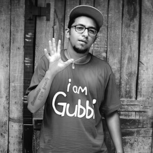 Karthik Sundar Gubbi, aka Gubbi, is a multilingual rapper from Bengaluru known for his Kannada-English rap and diverse musical collaborations.